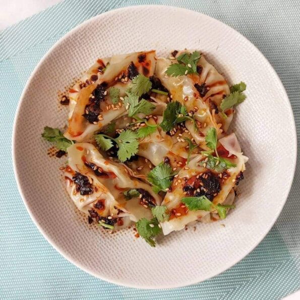 Vegetable gyoza served with chilli oil