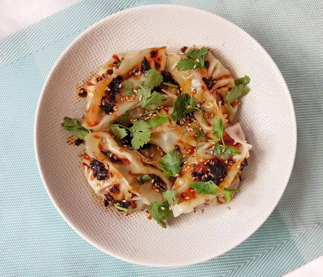 Vegetable gyoza served with chilli oil