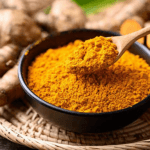 turmeric powder being spooned