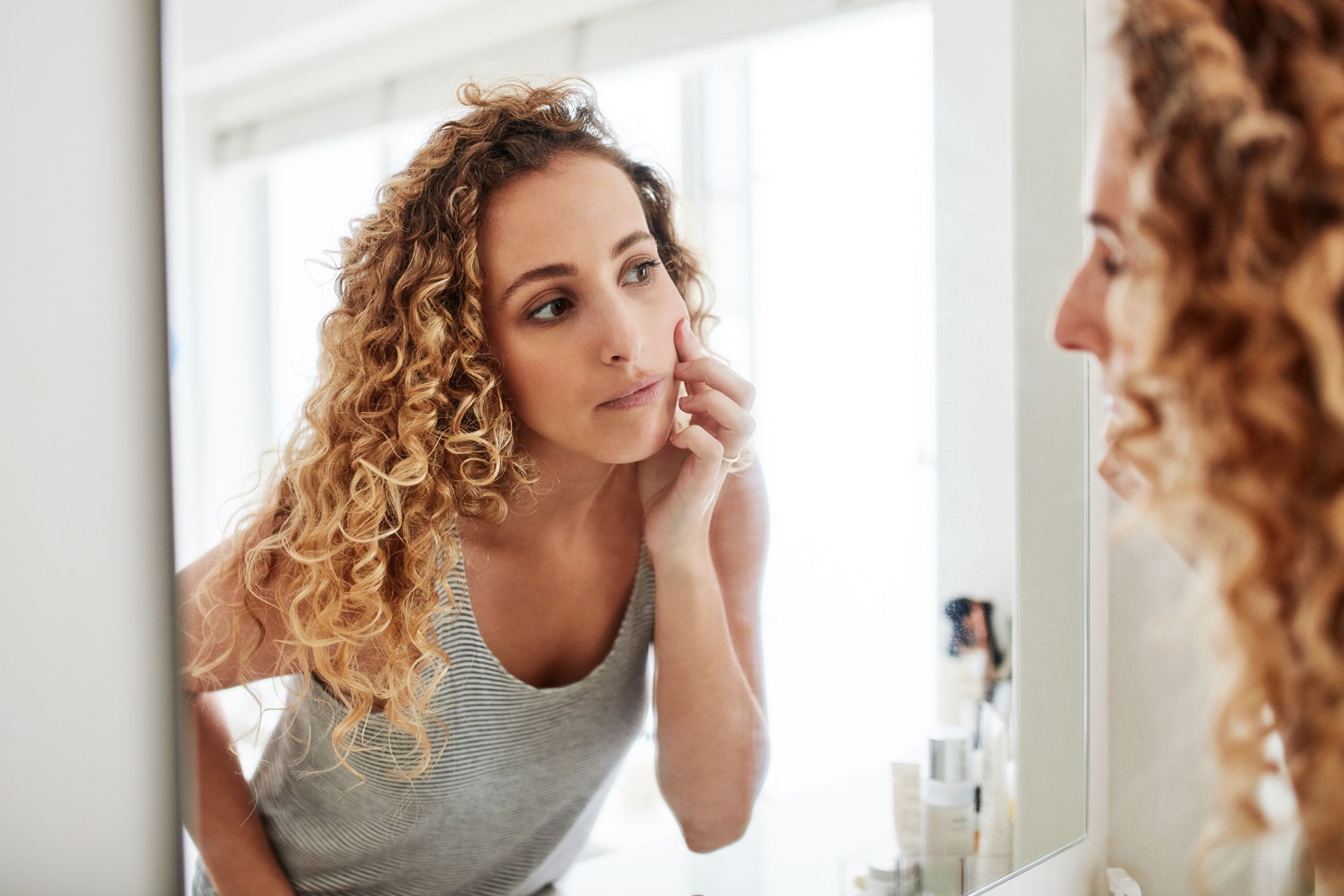 are you happy with the woman staring back at you royalty free image 1672772017